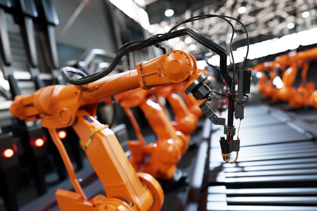 ramie robotu przemysłowego na produkcji